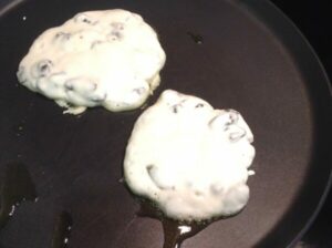 Raisin pancakes - cooking in a pan