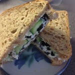 Olive, soft cheese and cucumber sandwich