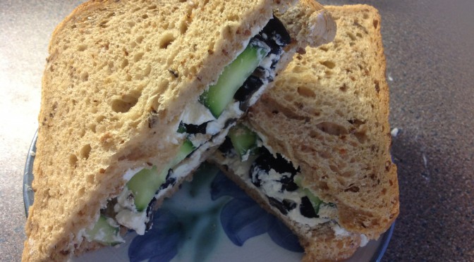 Olive, soft cheese and cucumber sandwich