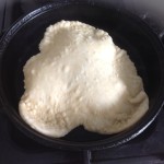 Flatbread cooking in pan
