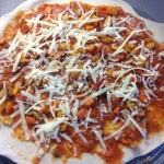 uncooked chorizo pizza