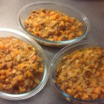 beef ragu portioned out onto 3 dishes ready to be made into 3 separate recipes.
