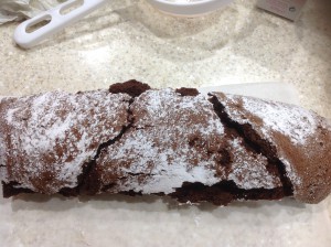 Chocolate Roulade on a translucent plate.