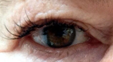 one eye with false lashes
