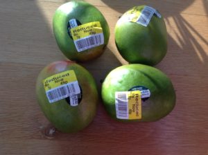 Yellow sticker mangoes