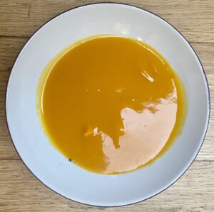 mango pulp in a white bowl.