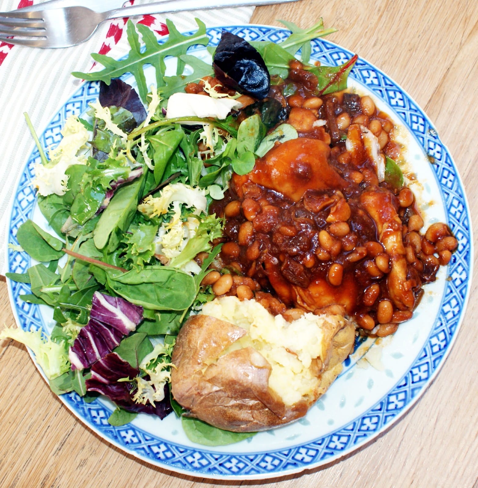 Chicken thighs in soy and honey, with a baked potato and salad