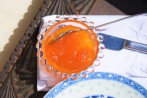apricot jam in a small glass dish