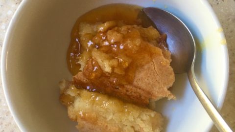 baked marmalade sponge in a white bowl