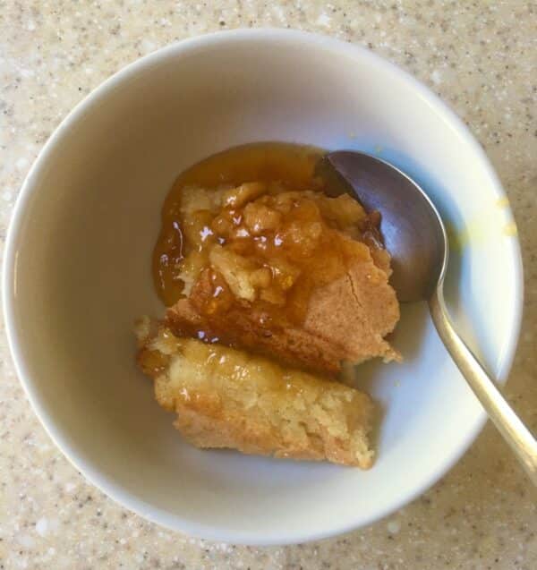 baked marmalade sponge in a white bowl
