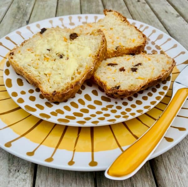 carrot and sultana loaf - slices on plate, close up