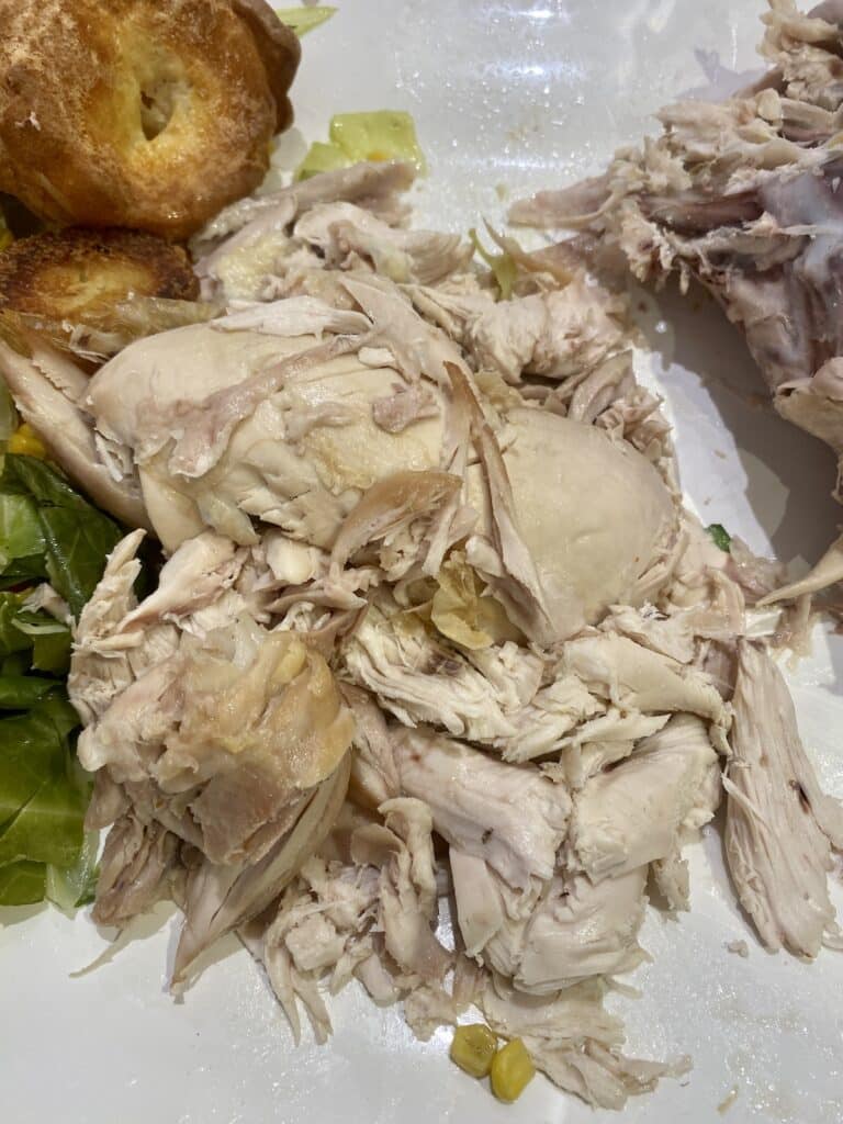 meat stripped from roast chicken