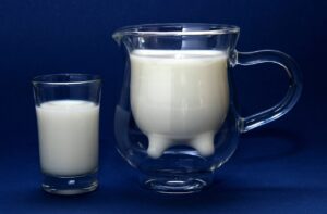Using up leftover milk - a glass jug of milk, with a glass of milk beside it