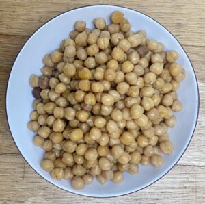 chickpeas in a white bowl.