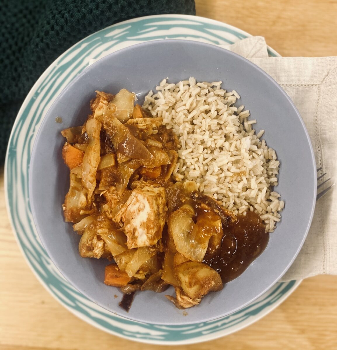 leftover turkey curry in a blue bowl.