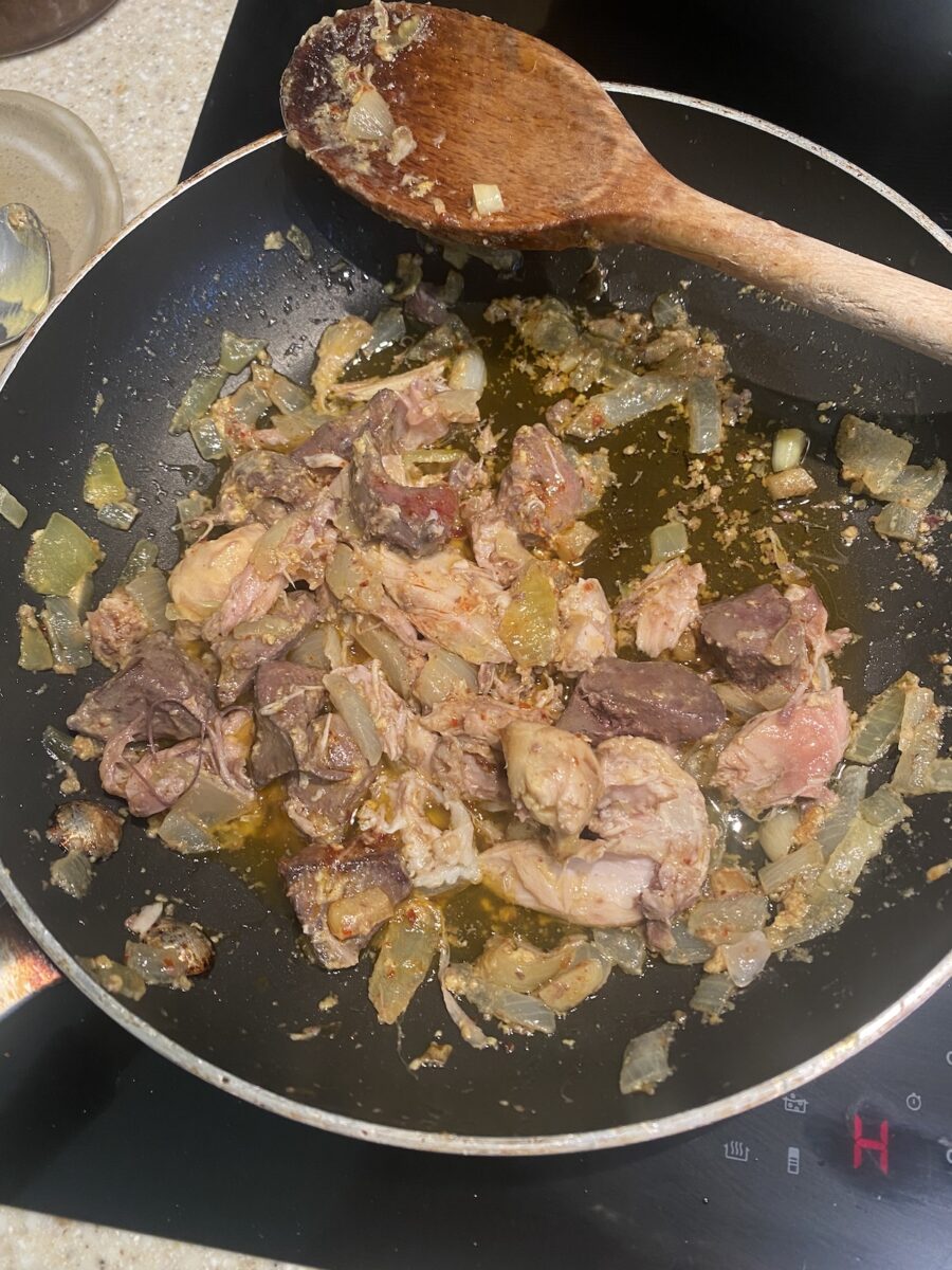 turkey liver, onions, garlic and leftover cooked turkey in small frying pan. 